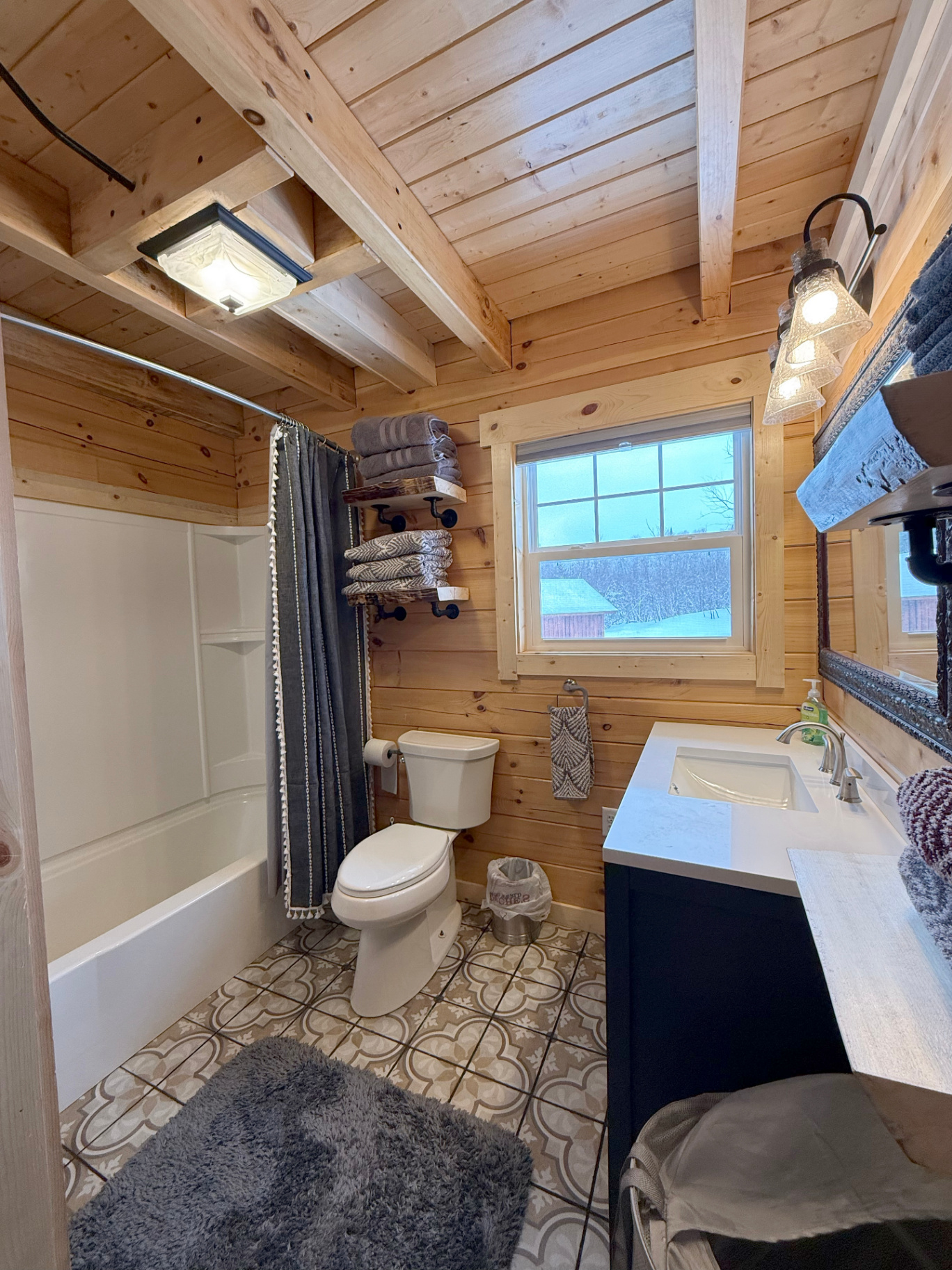 Bathroom with tub and shower