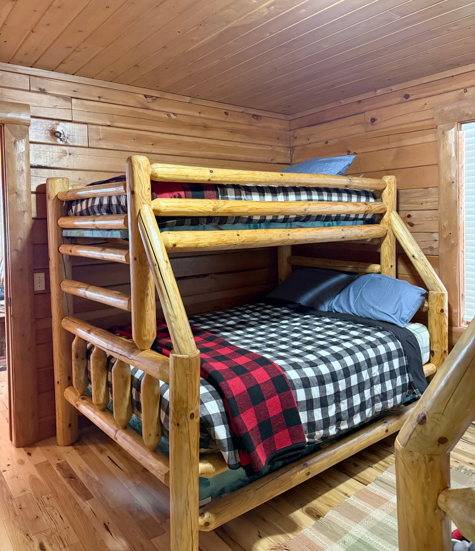 Log bunk beds — twin over full