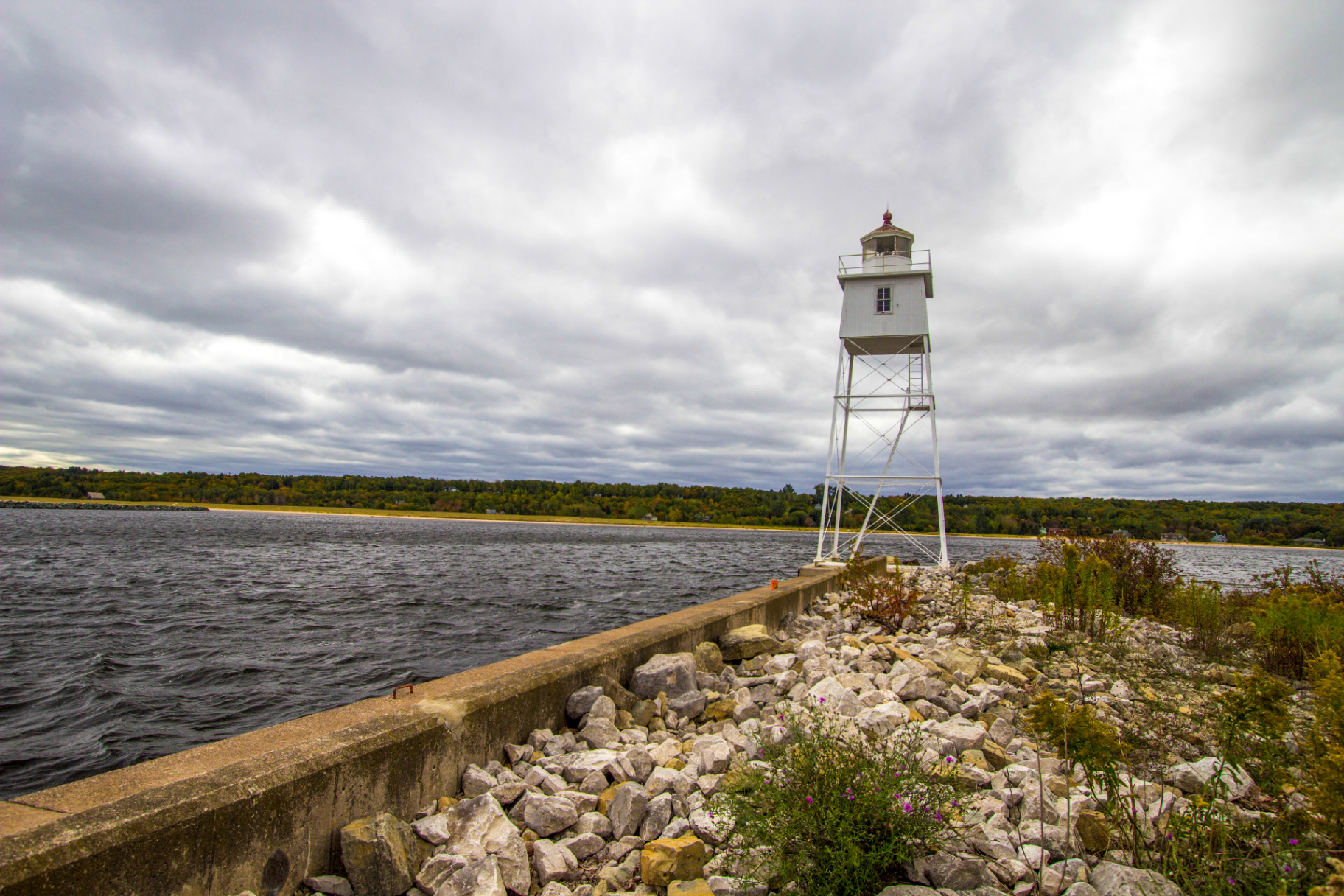 Grand Marais lighthouse standing beside the breakwall