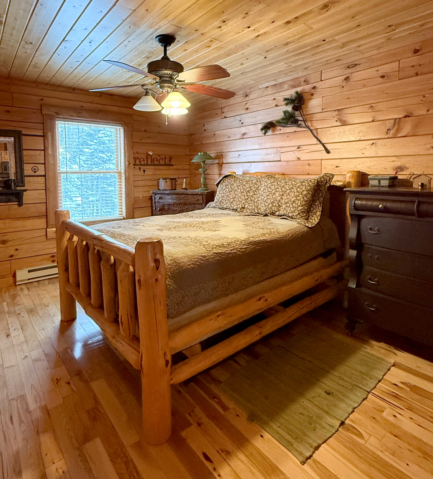 Master bedroom with queen log bed