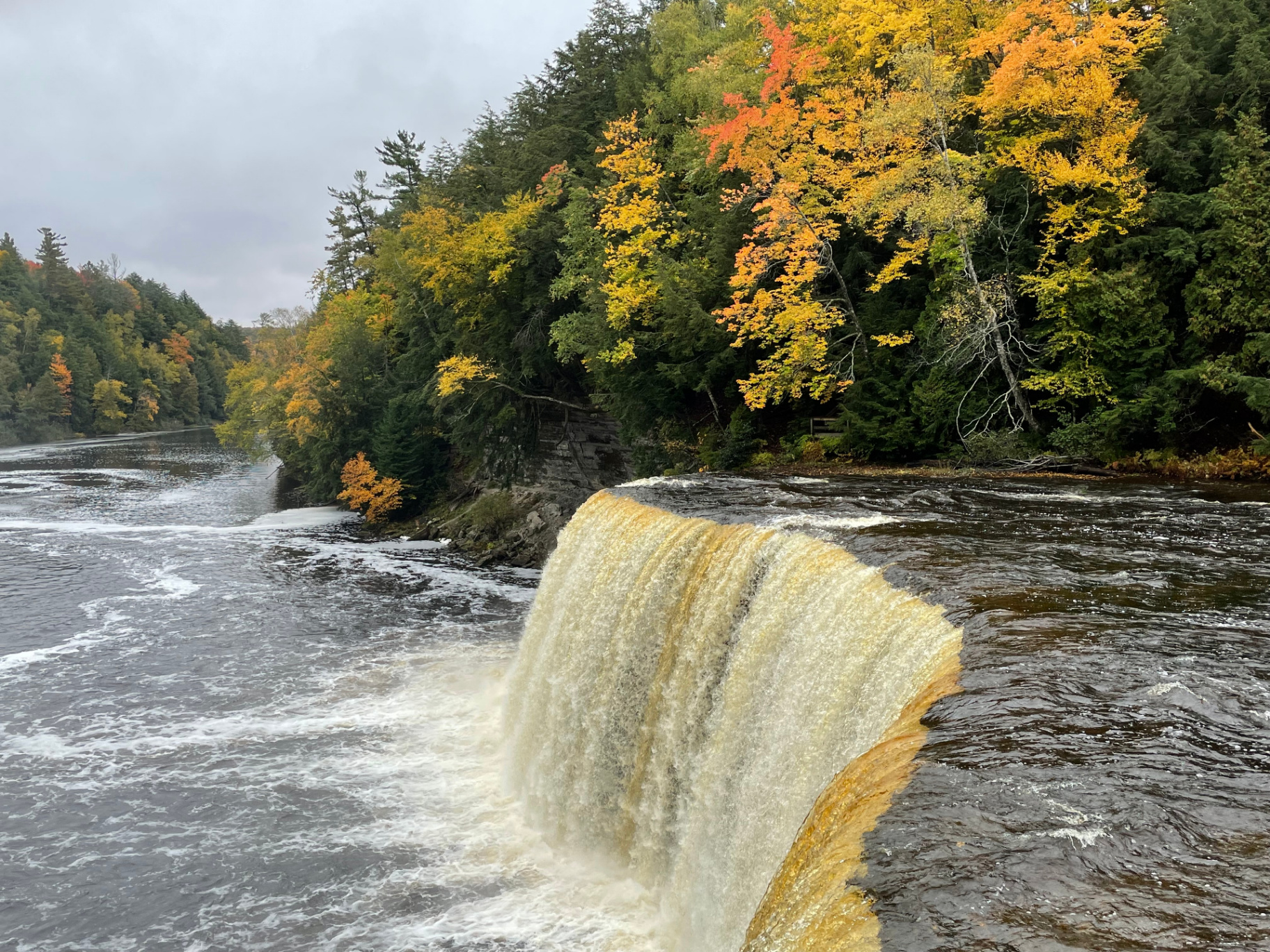 Golden Tahquamenon Falls with fall foliage